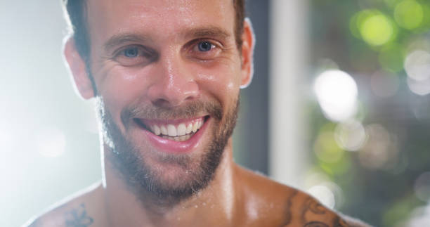 Cropped portrait of a handsome young male athlete working out in the gym