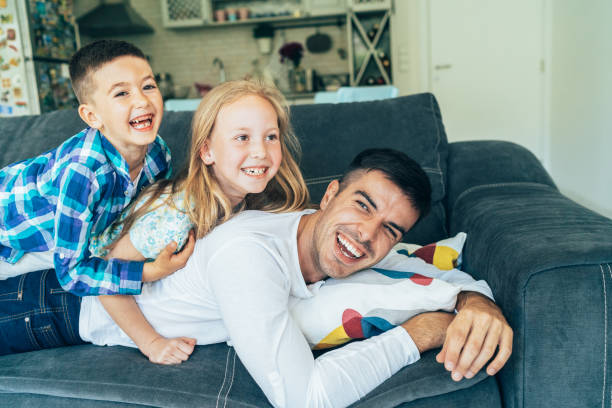 istock Father and children's time 1158786941