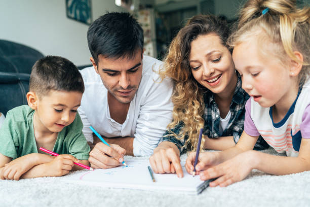 istock Young family drawing 1158786955