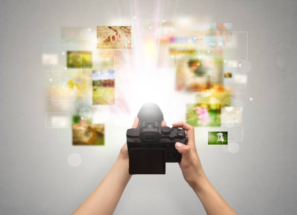 Hand captures life events with digital camera