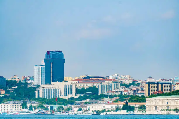 Photo of Istanbul modern European side Taksim square with exterior shot of The Ritz Carlton Istanbul Hotel and Suzer Plaza (Gokkafes) in Turkey