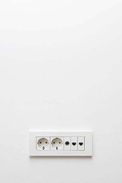 istock Wall in modern appartment with plugs for cable TV, internet, network and electricity 1158792233