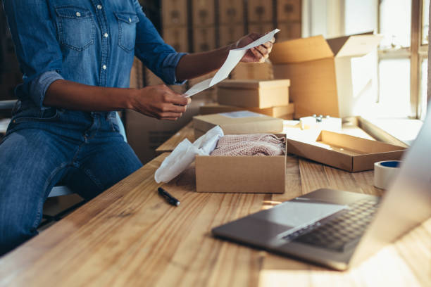 istock Female preparing shipment for delivery 1158792292