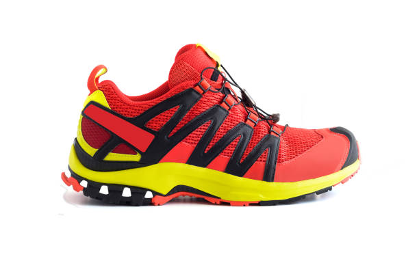 istock Side view of red trail running shoe or trekking boot 1158792362