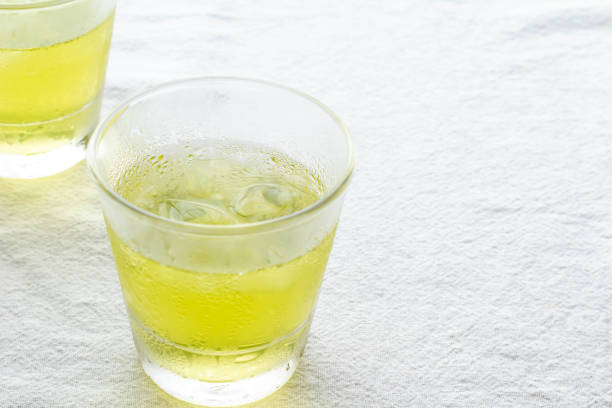 Cold green tea in a glass stock photo