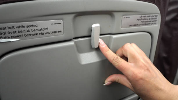 istock Female Open Airplane Tray Table on Seat Back and Prepare for Lunch 1158794205