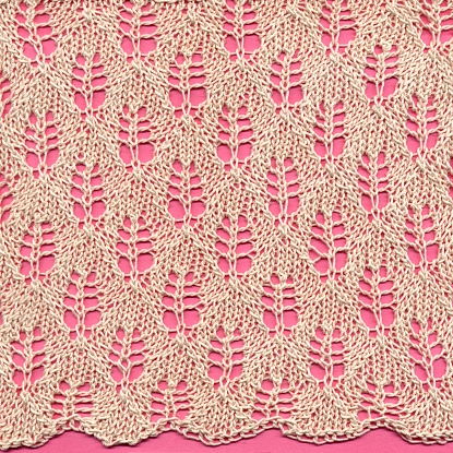 Knitted lace ground in a leaf or fern pattern.