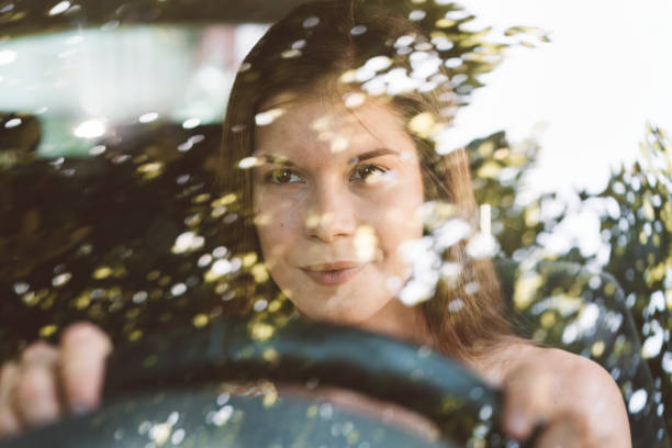 istock Focused woman driver on her way to work 1158796203