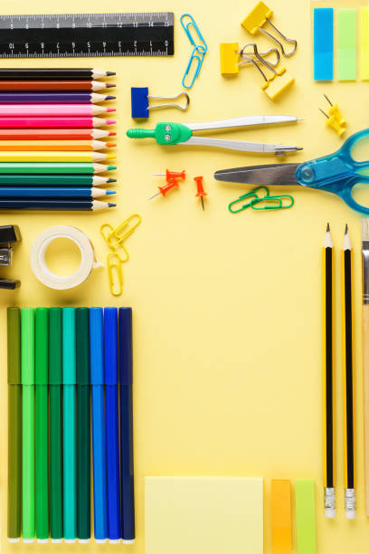 istock Colorful school stationery collection on yellow background. 1158796866