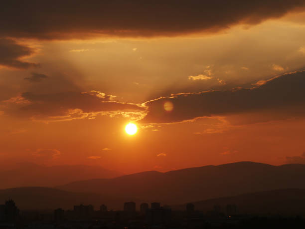 istock beautiful golden sunset sky landscape 1158797428