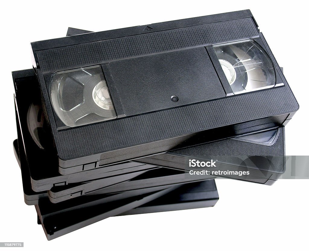 Mucchio di retrò nastri VHS cassette video - Foto stock royalty-free di Videocassetta