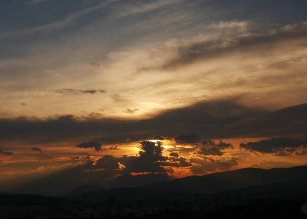 istock beautiful golden sunset sky landscape 1158798432