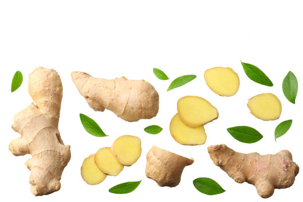istock sliced ginger with leaves isolated on white background top view 1158801122