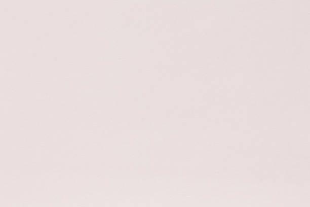 istock Paper texture light rough textured spotted blank copy space background in beige yellow. 1158804987