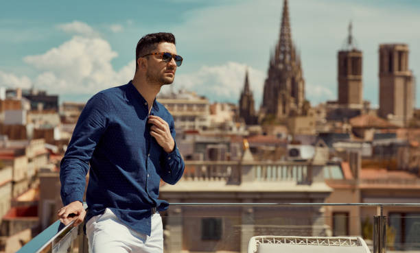 istock Young handsome man posing outdoor 1158805194