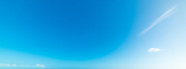 istock Blue sky and small clouds in the summertime 1158805656