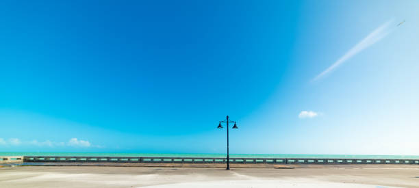 istock Lamppost in Edward B Night pier windrose on a sunny day 1158807462
