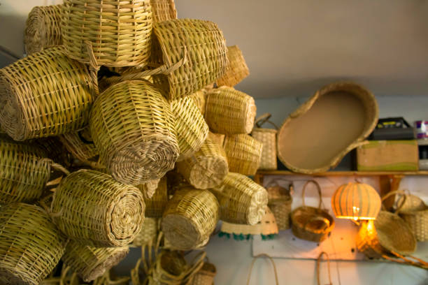 istock Taken inside the store. Knitted baskets on shelves. 1158808259