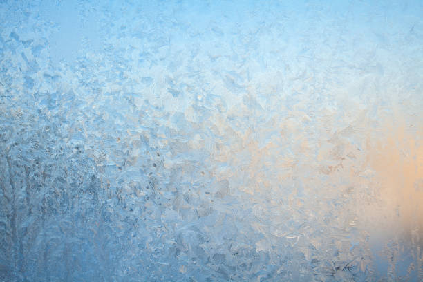 beautiful winter texture patterns of frost on the window