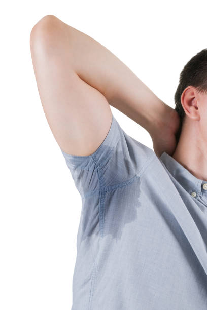 istock Man with sweaty armpits isolated on white background 1158814063
