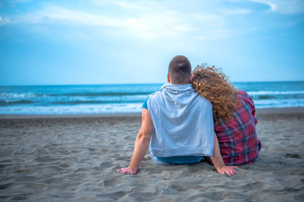 istock Couple on the beach 1158814261