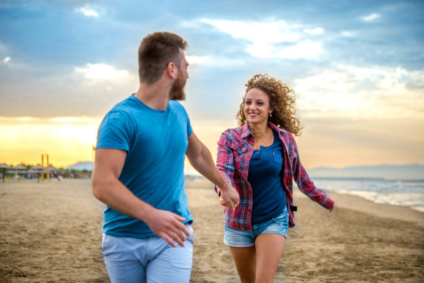 istock Couple on the beach 1158814958
