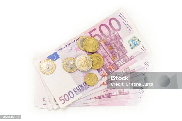 Stack Of Euro Banknotes And Coins Isolated 500 Euro Banknotes European Currency Money Banknotes Isolated On White Backdrop Top View Closeup Stock Photo - Download Image Now