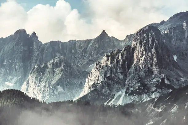 Dachstein massif in the Alps (mountains) with fog