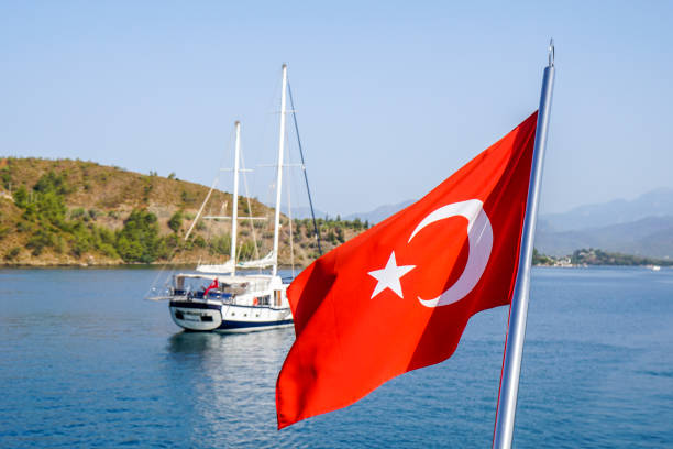 Turkish flag behind the yacht.
