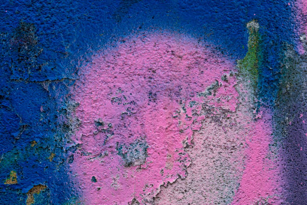 istock Old cracked rusty peeled colorful paint background texture close-up 1158818270
