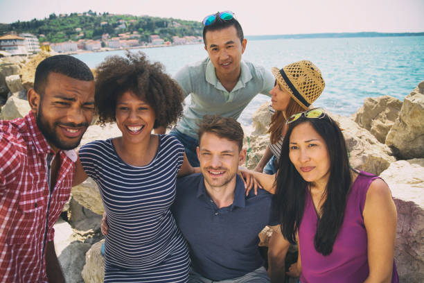 istock Group selfie by the sea 1158818417