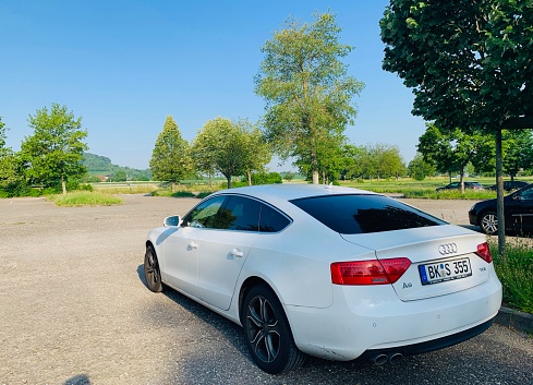 Oberstenfeld, Germany - June, 27 2019: AUDI  A5 TDI Coupe in public parking spot