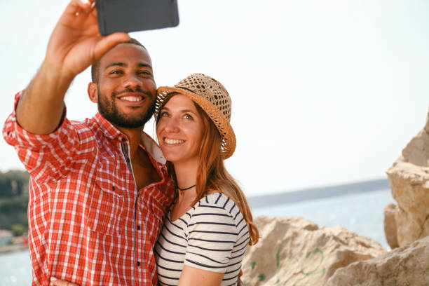 istock Tourists in a new city taking selfie 1158818678