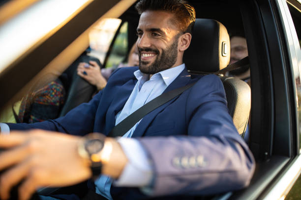 istock Macho man driving a car 1158818750