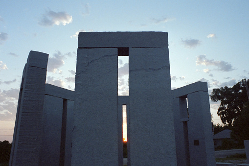 Summmer solstice sunset at a reproduction of stonehenge constructed at the University of Missouri-Rolla.