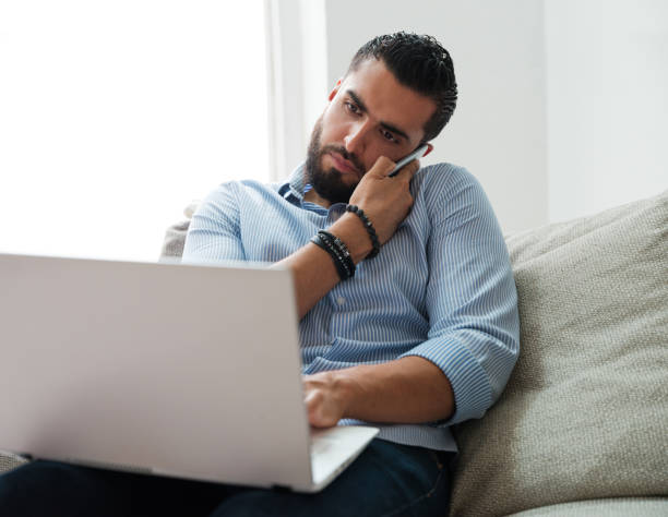 istock Man dealing with business affairs from home 1158821984