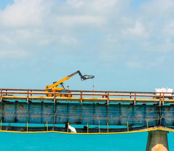 istock Industrial vehicle on a bridge in Florida Keys 1158825909