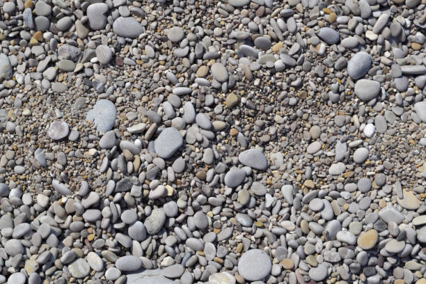 istock Nice background image of pebbles on a beach 1158827859