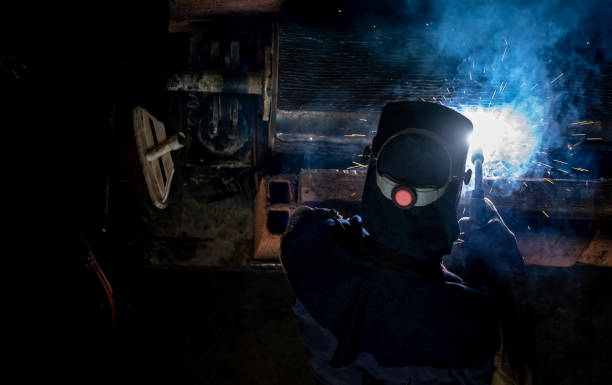 istock Man welding at a metallurgy factory 1158830203