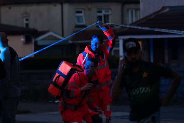 hit and run incident involving cyclist on leeds old road, bradford, bd3 27-6-2019. police and air ambulance on scene - hit and run imagens e fotografias de stock