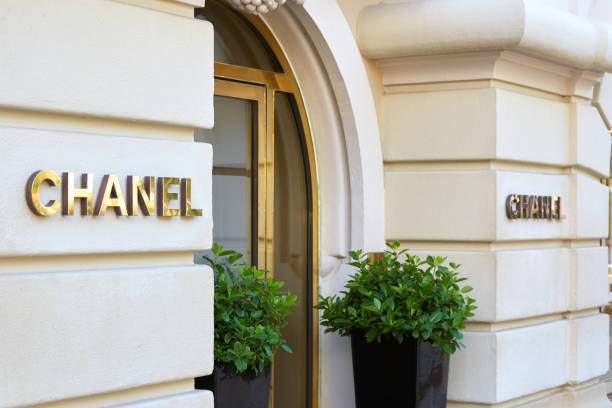 Chanel fashion and jewelry luxury store entrance with golden sign in Monte Carlo, Monaco Monte Carlo, Monaco - August 21, 2016: Chanel fashion and jewelry luxury store entrance with golden sign in Monte Carlo, Monaco. monte carlo photos stock pictures, royalty-free photos & images