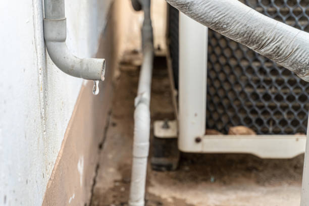 Dirty drainpipe from air conditioning stock photo