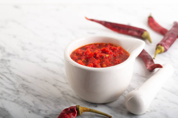 Traditional Maghrebi hot chili pepper sauce paste harissa. Tunisia and Arabic stock photo