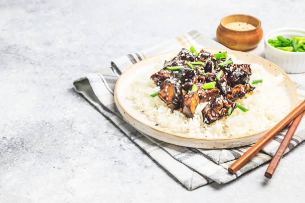 istock Eggplant teriyaki with rice and sesame sprinkle. 1158847489