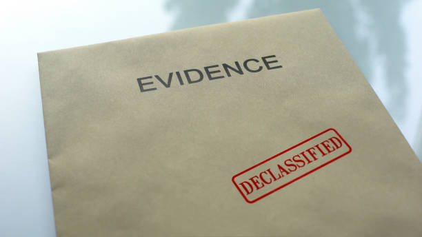 istock Evidence declassified, seal stamped on folder with important documents, police 1158848641