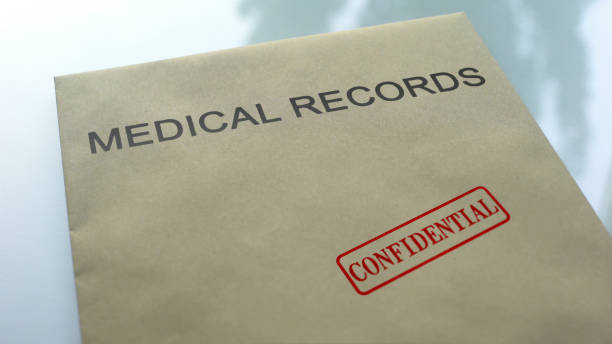 istock Medical records confidential, seal stamped on folder with important documents 1158848716