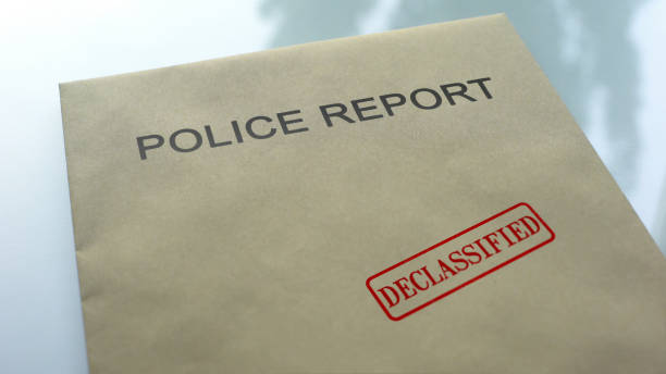 istock Police report declassified, seal stamped on folder with important documents 1158848854