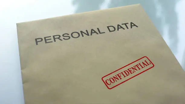 Photo of Personal data confidential, seal stamped on folder with important documents