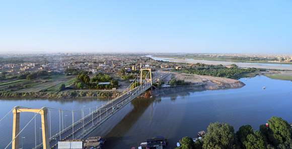 Khartoum, Sudan: Tuti Island, where the White Nile and Blue Nile merge to form the main Nile - Tuti bridge on Arbab Al Qaed Avenue - Khartoum North / Khartoum Bahri in the background