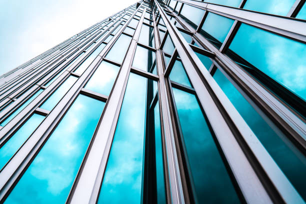 istock Architecture details Modern Building Glass facade Business background 1158853241